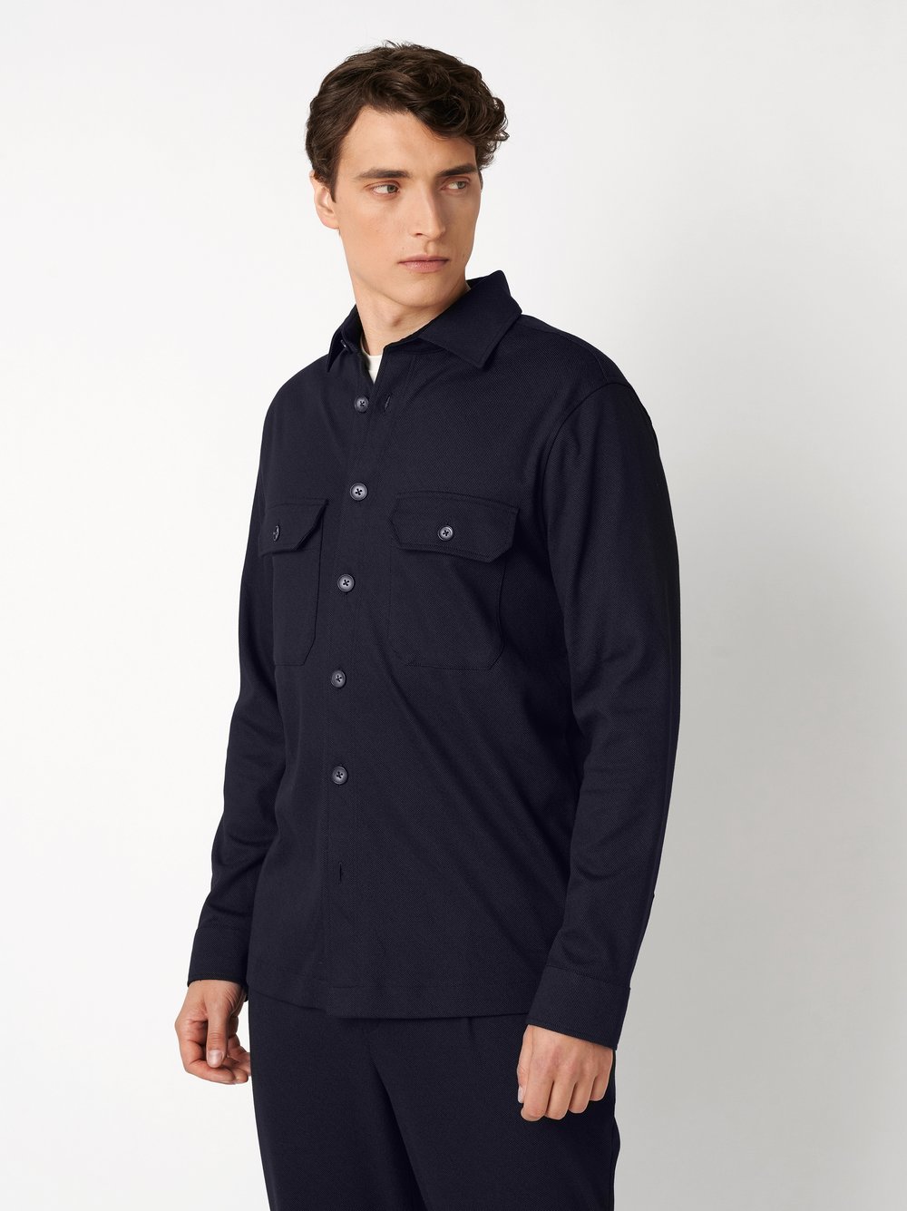 Mens shirt casual overshirt kent in dark navy twill, front view worn by model