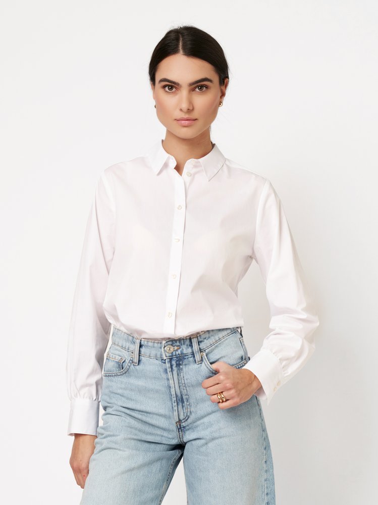Womens blouse Lizzy in solid white, front view worn by model