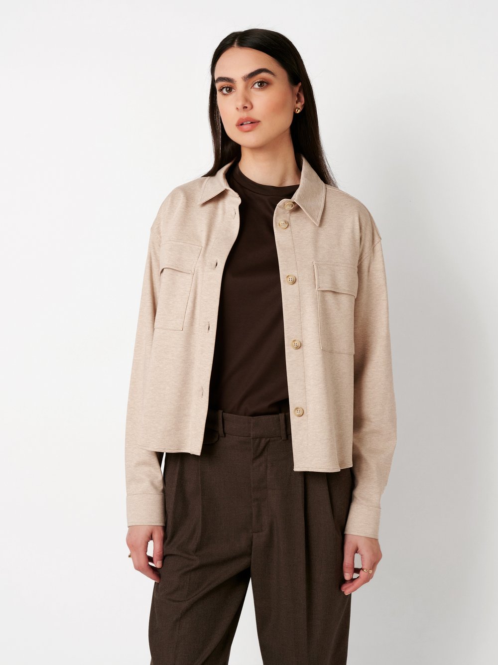 Womens blouse Sina in beige, front view worn by model