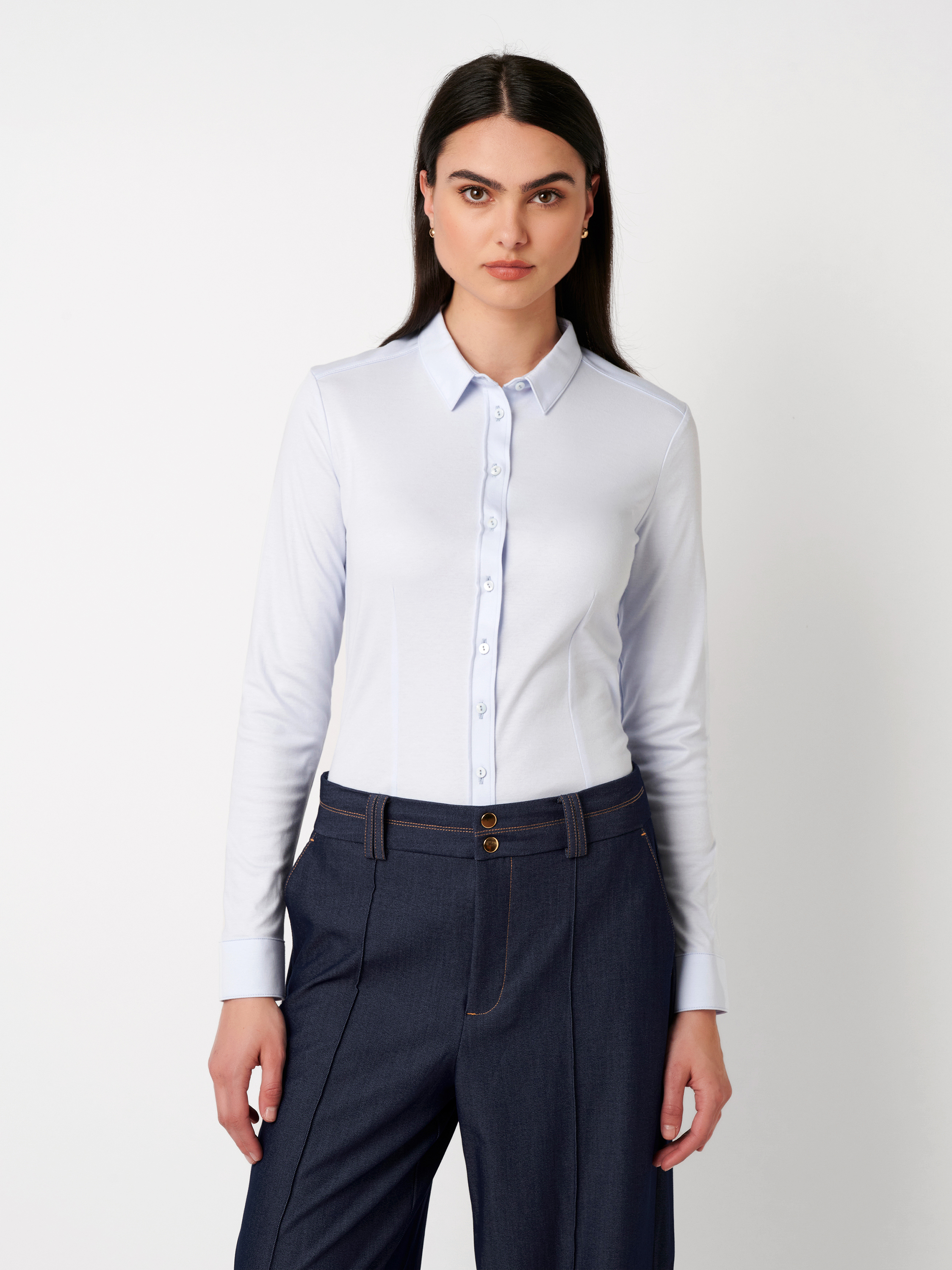 Womens blouse Pia in solid light blue, front view worn by model
