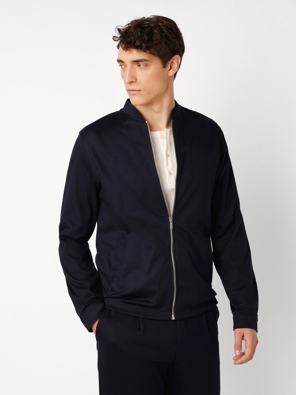 Mens jacket  in solid navy, front view worn by model