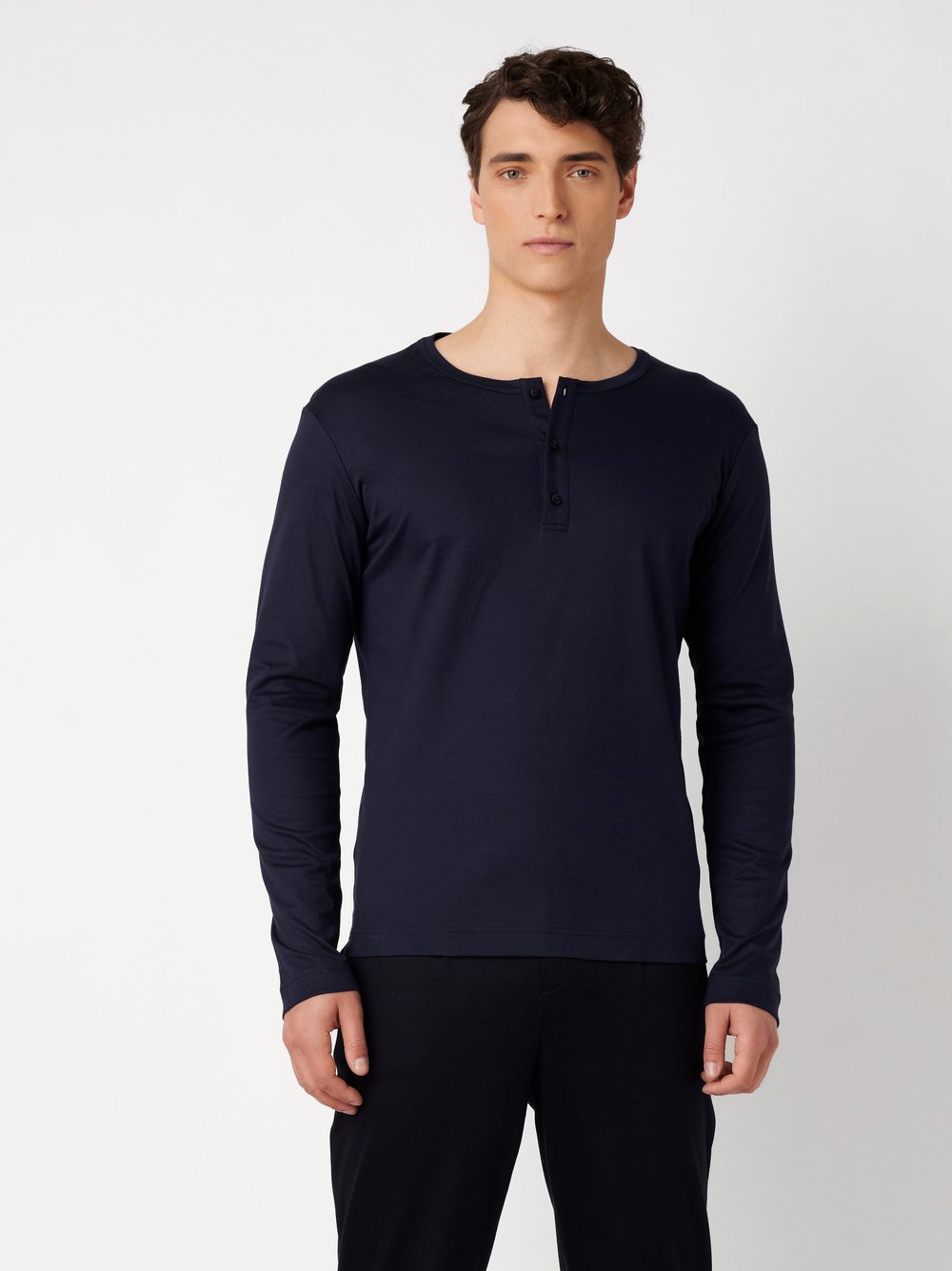 Mens polo shirt casual henley in solid navy, front view worn by model
