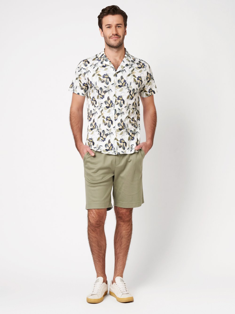 Mens shorts casual in solid green, outfit view worn by model