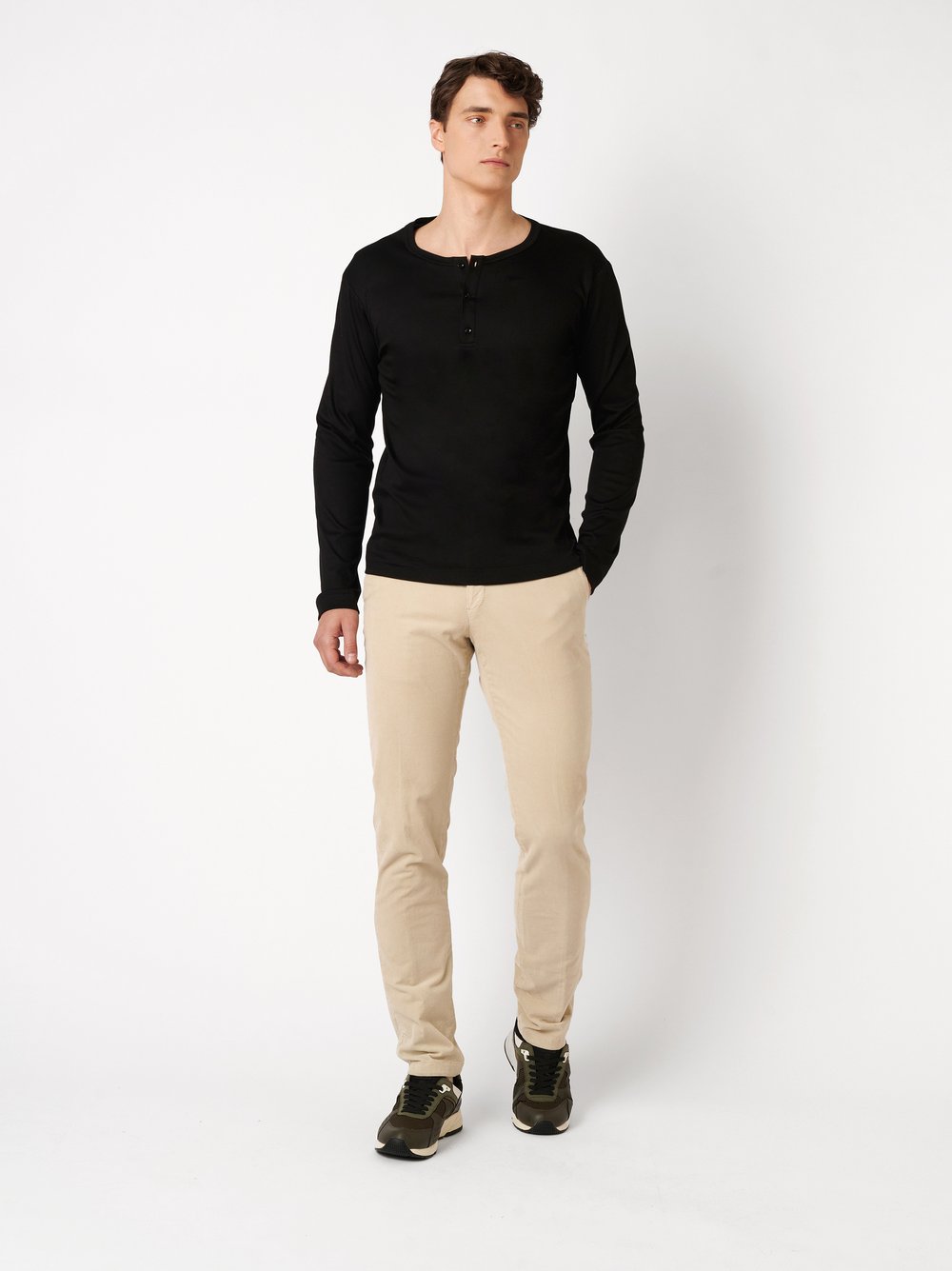 Mens polo shirt casual henley in solid black, outfit view worn by model