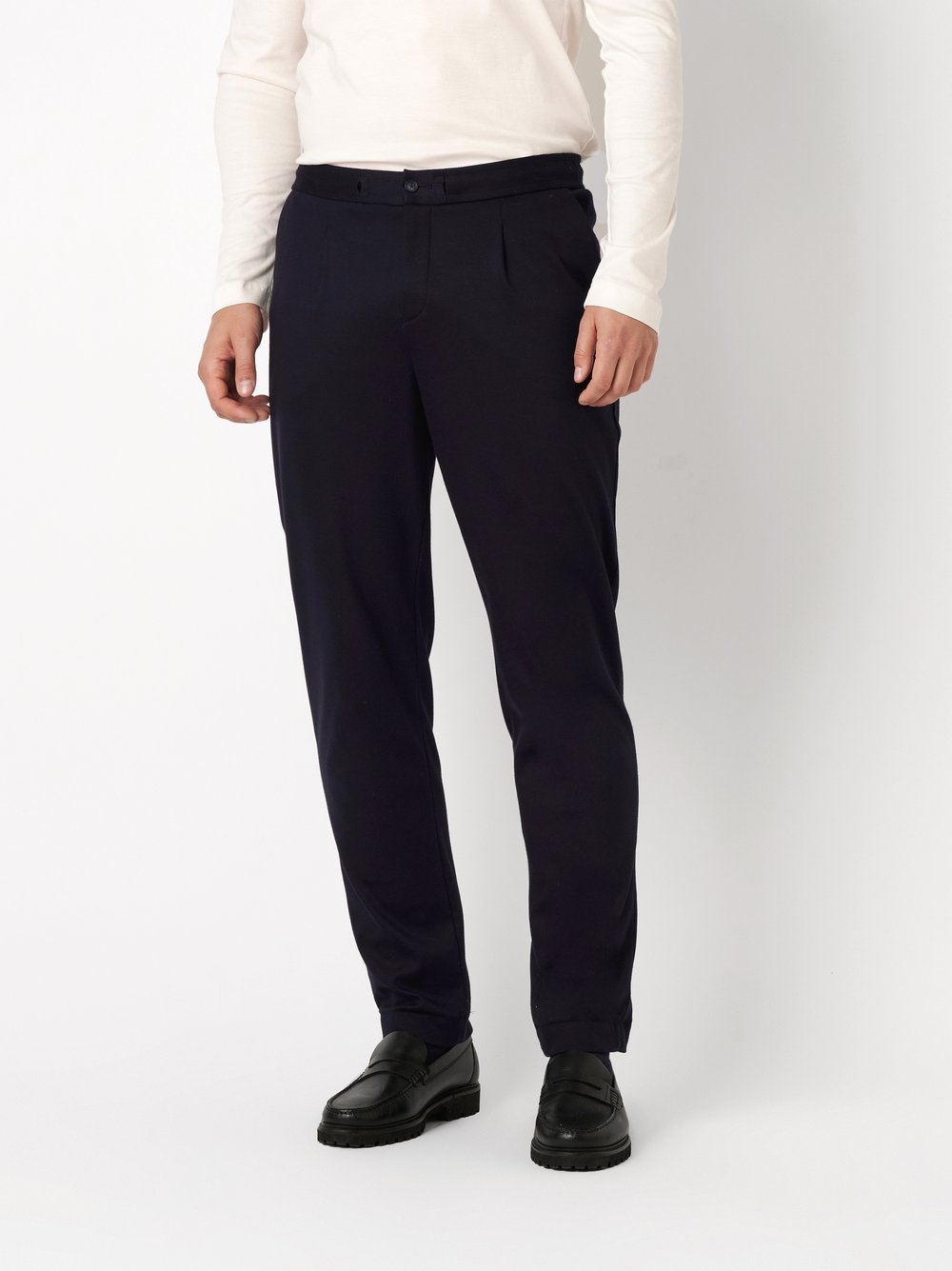 Mens trousers casual in solid navy, front view worn by model