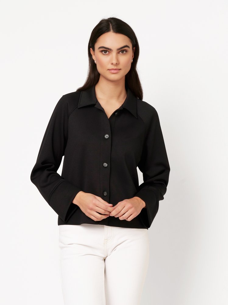 Womens blouse Sina in black, front view worn by model