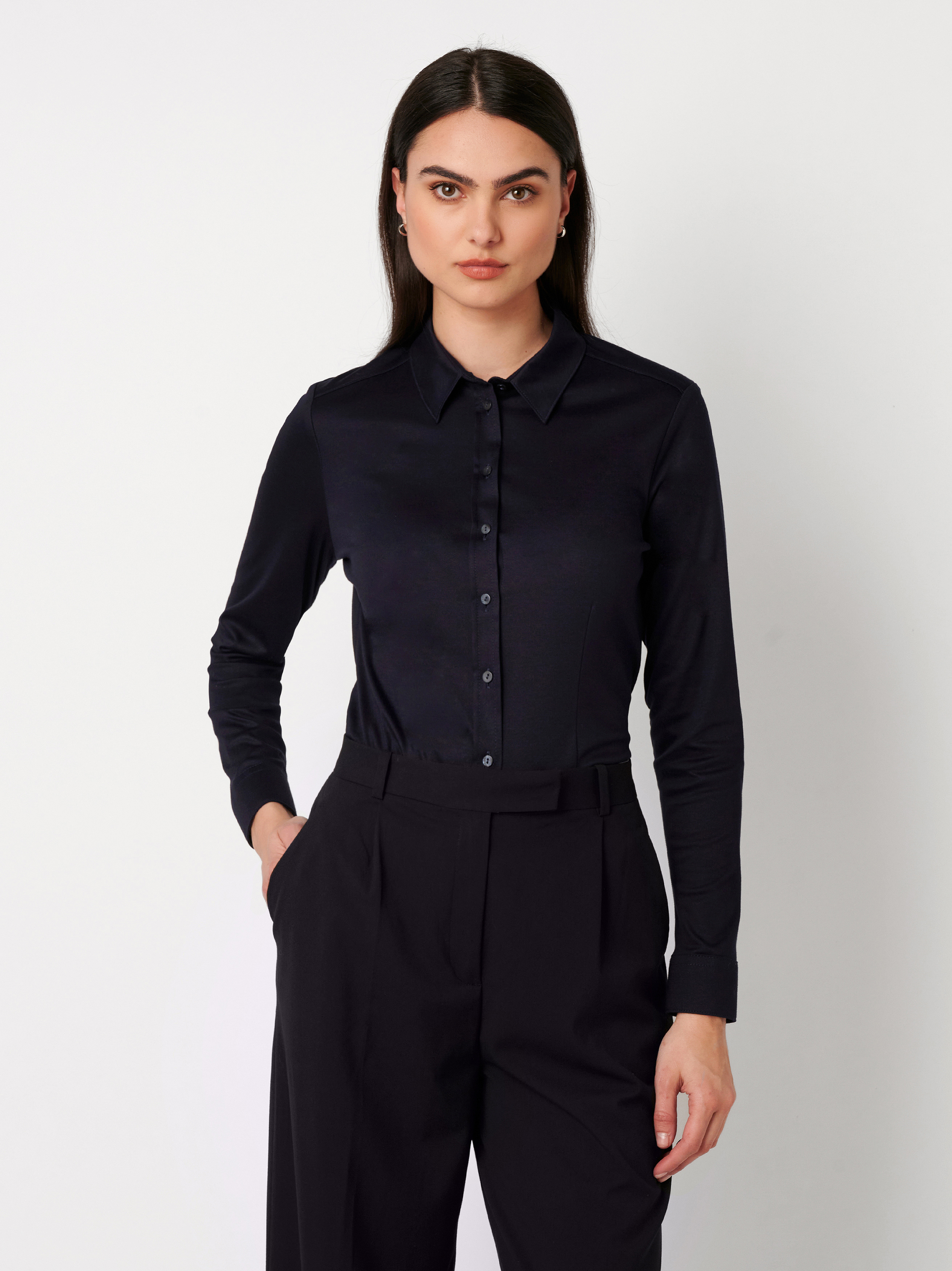 Womens blouse Pia in solid midnight blue, front view worn by model