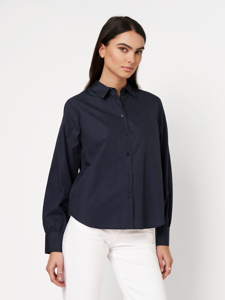 Womens blouse Lizzy in solid true navy, front view worn by model