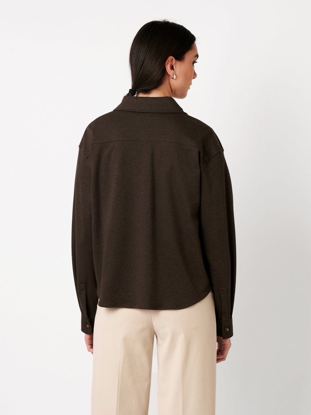 Womens blouse Sina in chocolate, back view worn by model