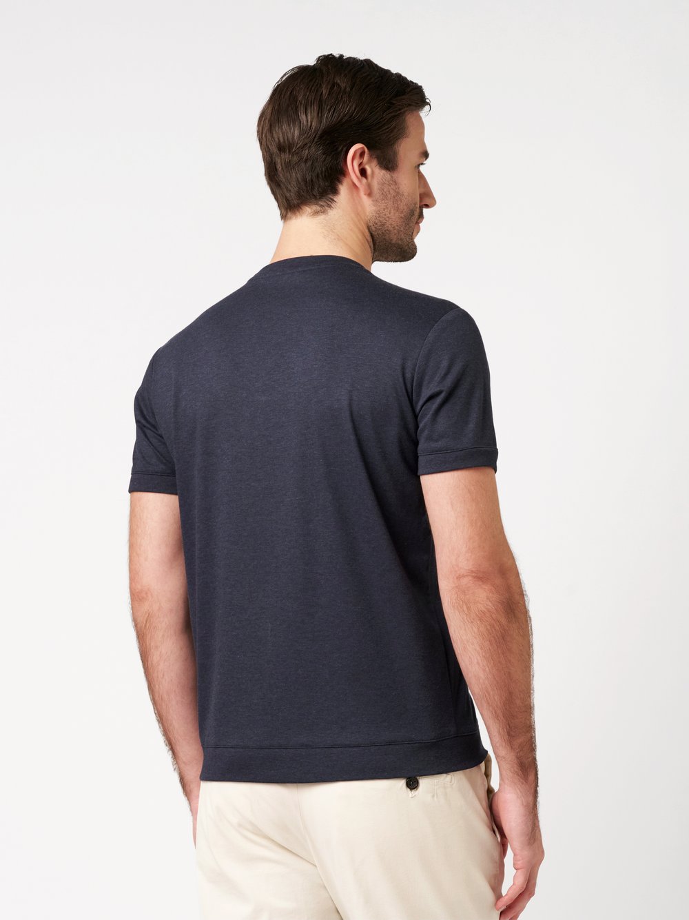Mens T-shirt luxury roundneck in blue oxford, back view worn by model