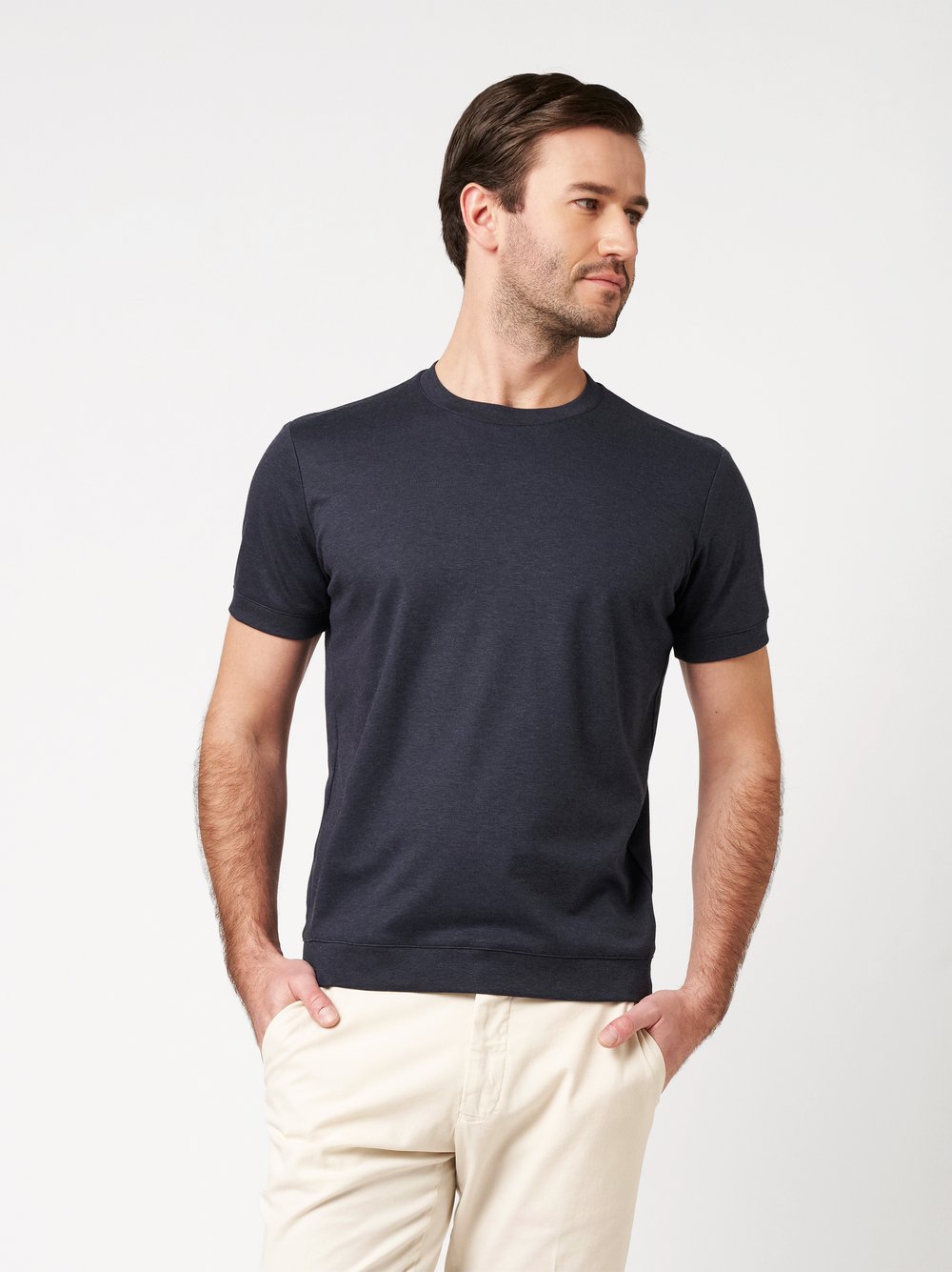 Mens T-shirt luxury roundneck in blue oxford, front view worn by model